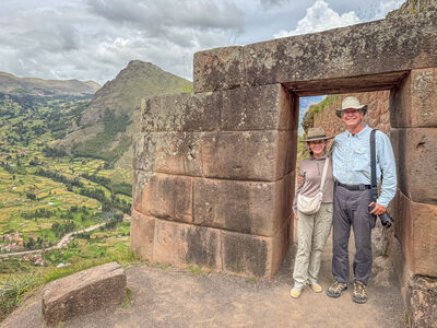 Virginia Ann and Cal standing in a gate to the complex with the valley floor