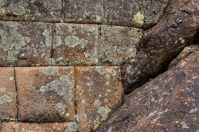 Rocks cut to fit the bedrock perfectly