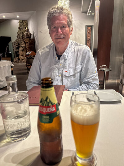 Cal enjoying Cusquena beer