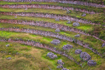 Piles of stones with unknown placement